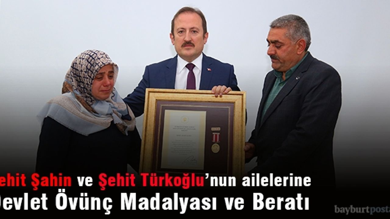 Şehit Şahin ve Şehit Türkoğlu'nun ailelerine Devlet Övünç Madalyası ve Beratı
