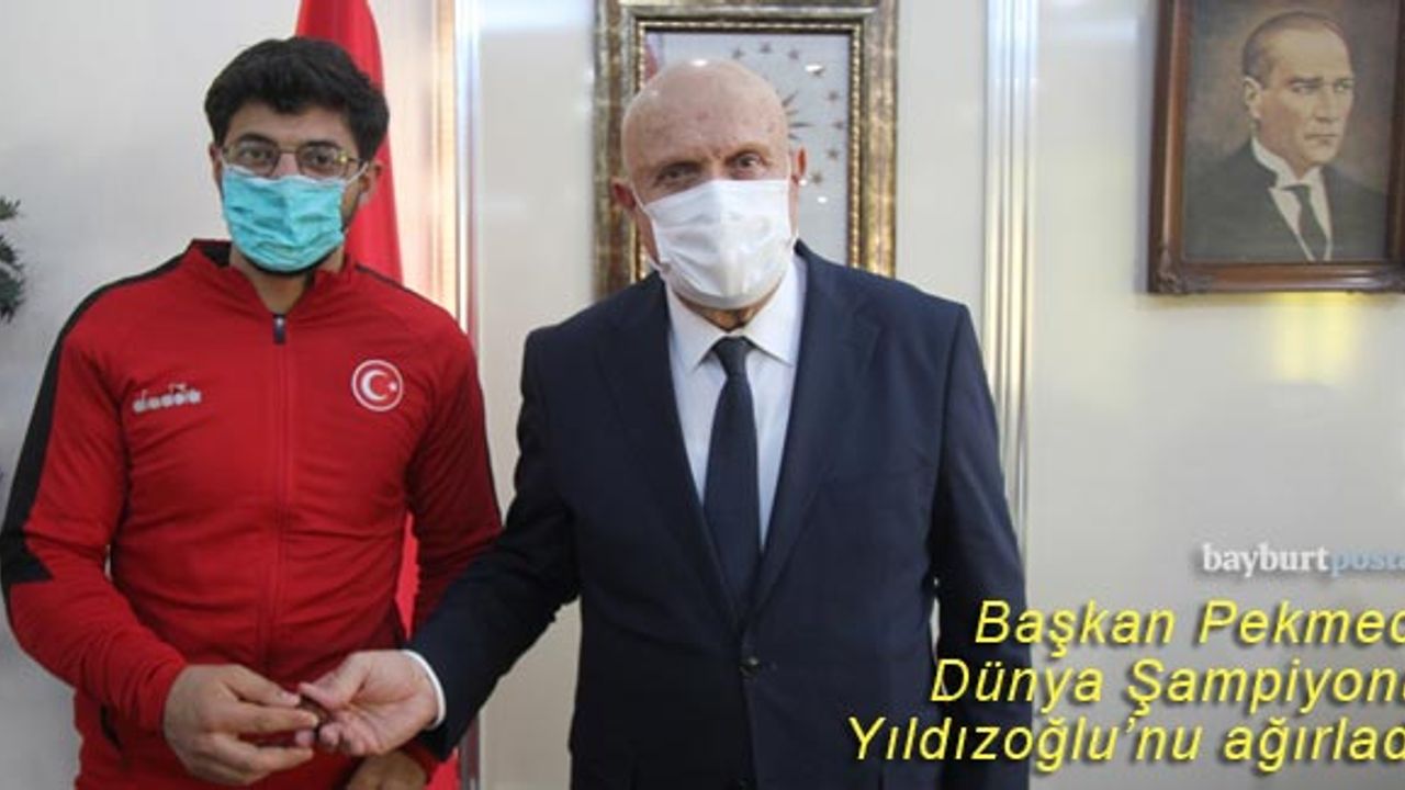 Başkan Pekmezci, Dünya Şampiyonu Yıldızoğlu'nu ödüllendirdi