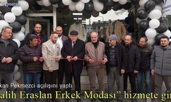 Başkan Pekmezci, "Salih Eraslan Erkek Modası"nın açılışına gerçekleştirdi