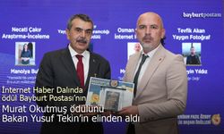 Murat Okutmuş, ödülünü Milli Eğitim Bakanı Yusuf Tekin'in elinden aldı