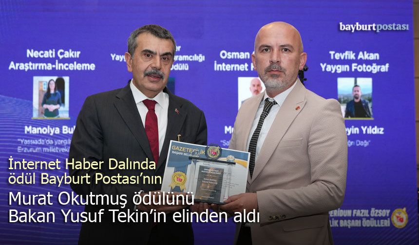 Murat Okutmuş, ödülünü Milli Eğitim Bakanı Yusuf Tekin'in elinden aldı